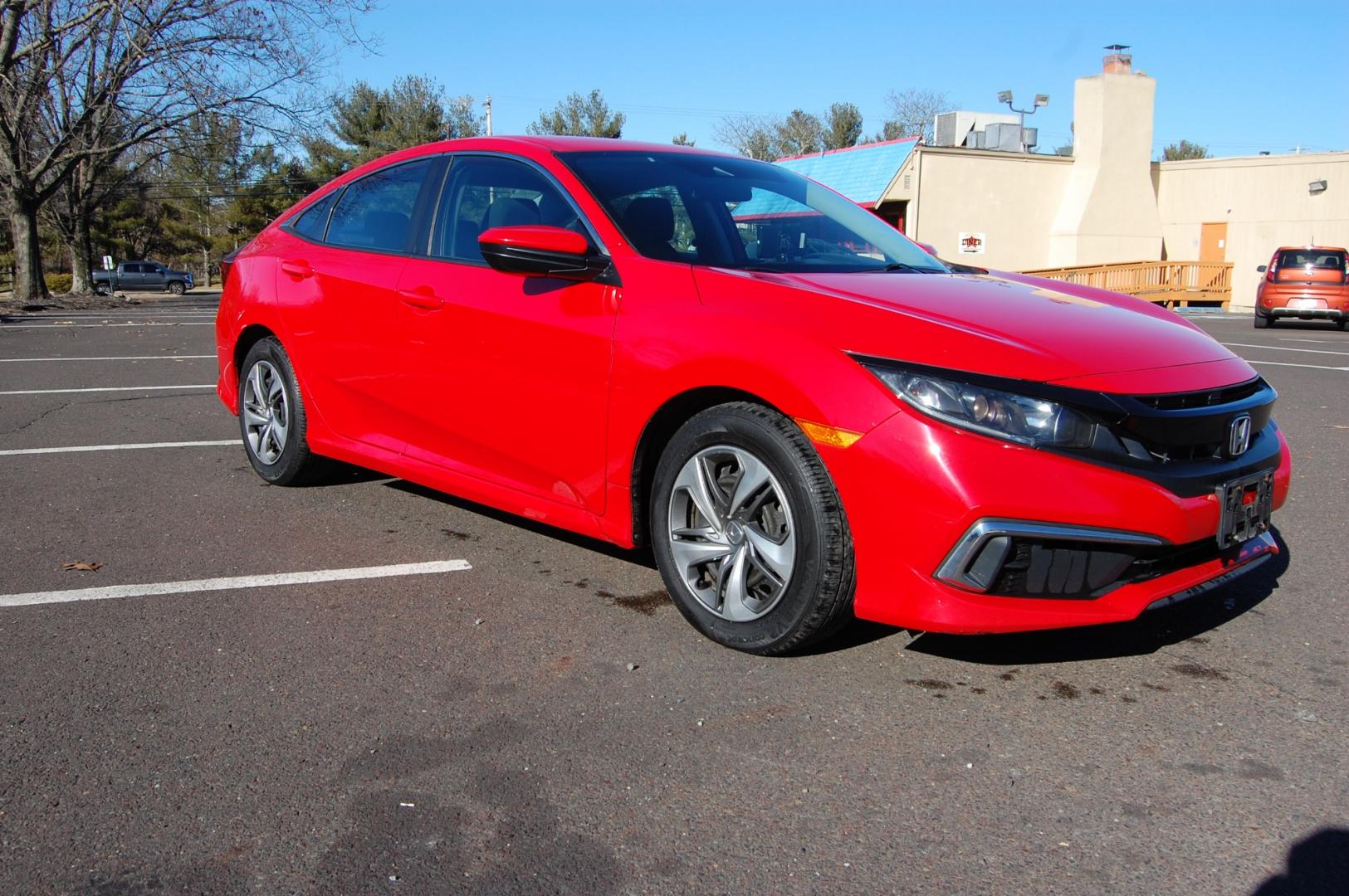 2019 RED /Black Cloth Honda Civic (2HGFC2F60KH) with an 2.0 Liter engine, Automatic transmission, located at 6528 Lower York Road, New Hope, PA, 18938, (215) 862-9555, 40.358707, -74.977882 - One family owned 2019 Honda Civic LX sedan powered by a 2.0 Liter 4 cylinder engine, front wheel drive, automatic transmission. Tilt wheel, cruise control, Dual front and side air bags, Side curtains airbags, ABS braking, AM/FM/Bluetooth/USB, Auto climate control, power windows, locks and mirrors, 1 - Photo#2